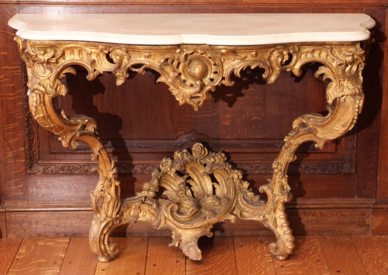 Very fine and rare pair of early Louis XV gilded consoles