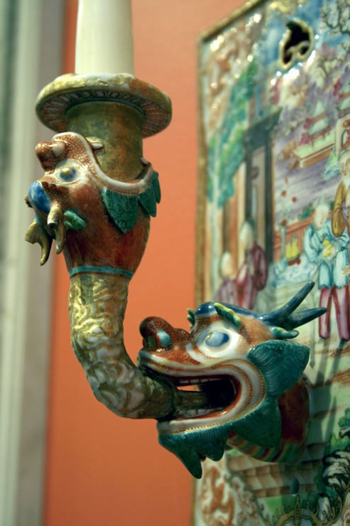 Pair of Chinese export wall lights with dragon form candle arms
