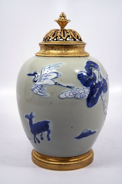 Kangxi  celadon fleuri vase with Rgence ormolu mounts.