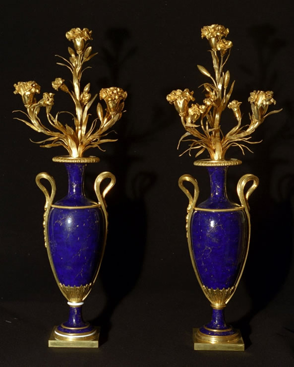 Pair of neoclassical ormoulu and Svres porcelain candelabra. 
