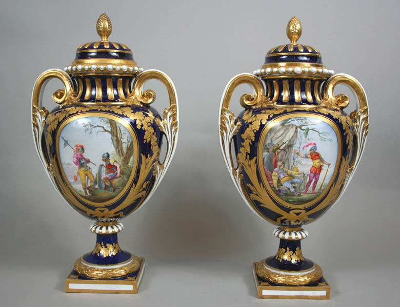 Pair Svres vases ovoides with historical military scenes