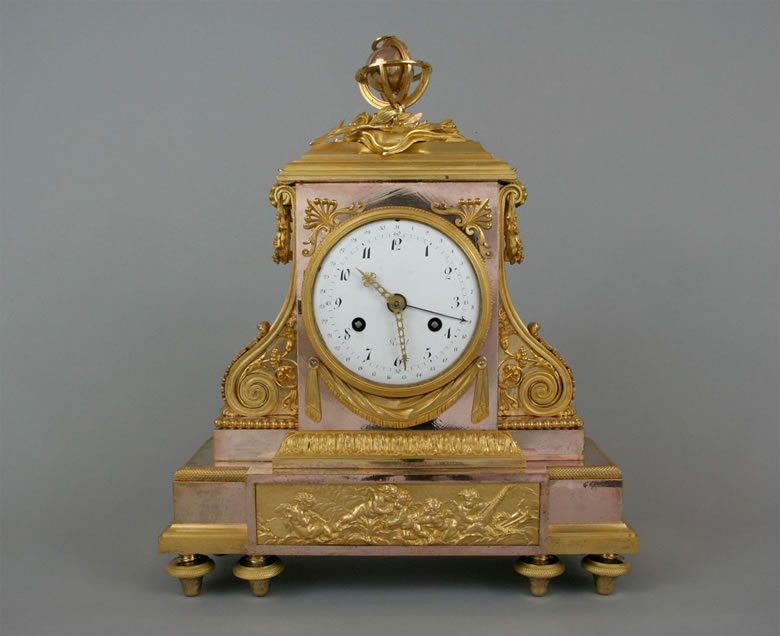 Louis XVI clock by Revel with exceptional two-colored gilding