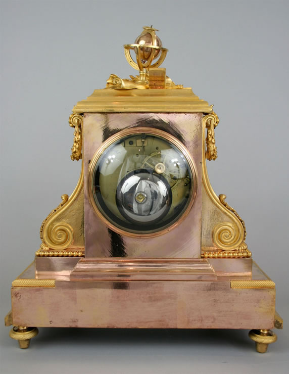 Louis XVI clock by Revel with exceptional two-colored gilding