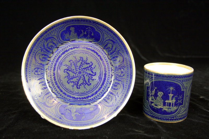 Svres chinoiserie and arabesque decorated coffee can and saucer (goblet litron et soucoupe.)