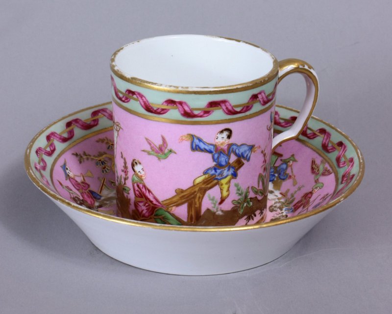 Sevres Chinoiserie pink ground cup and saucer