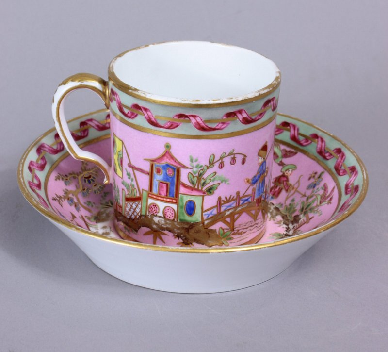 Sevres Chinoiserie pink ground cup and saucer