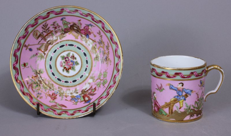 Sevres Chinoiserie pink ground cup and saucer