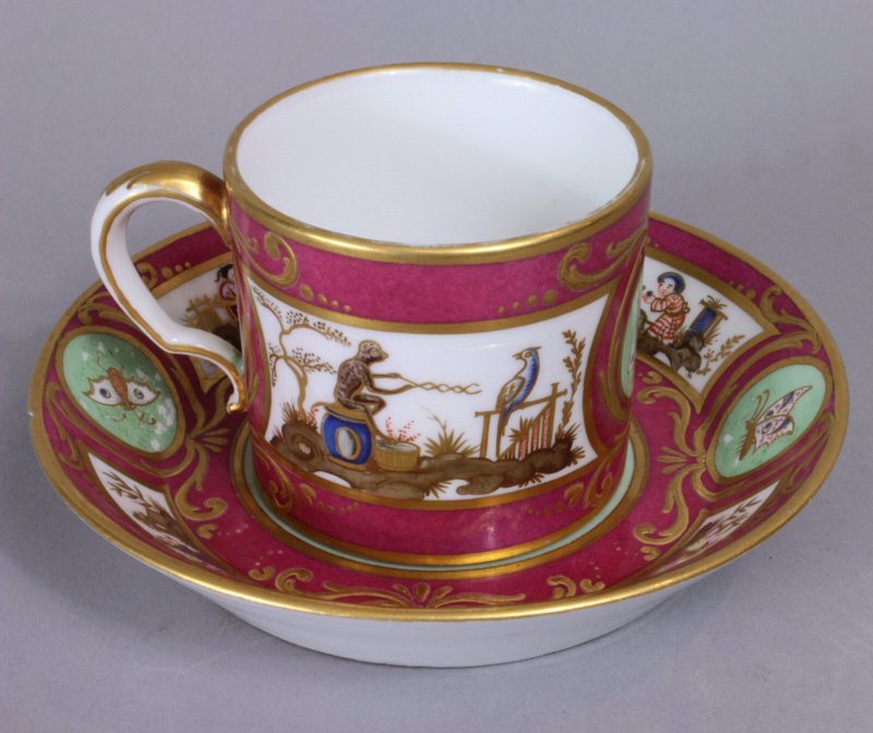 Sevres cerise and celadon Chinoiserie cup and saucer