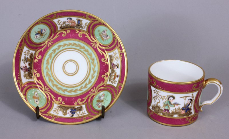 Sevres cerise and celadon Chinoiserie cup and saucer