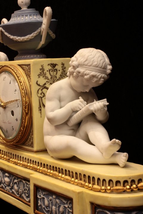 Dihl et Gurhard clock portraying reading and writing children