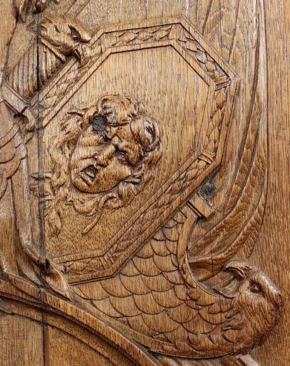 Neoclassical oak boiserie panel with military trophy