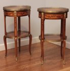 Pair of oval transitional marquetry tables signed Topino