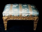 Italian neoclassical carved and gilded footstool