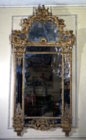 Rgence carved and gilded mirror