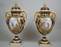 Pair Svres vases ovoides with historical military scenes