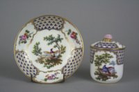 Sevres covered cup and saucer