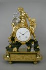 Directoire ormoulu, bronze patin and silvered bronze mantel clock by Deverberie