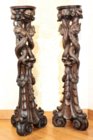 Italian baroque walnut pedestals symbolizing the Agathodaemon